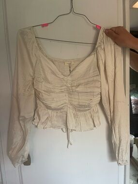 Promesa Cream Ruched Long-Sleeve Peplum Top